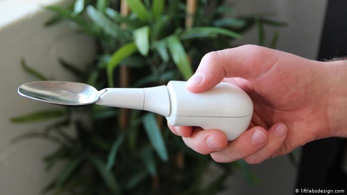 Lift-wearing design spoon compensates for hand tremor