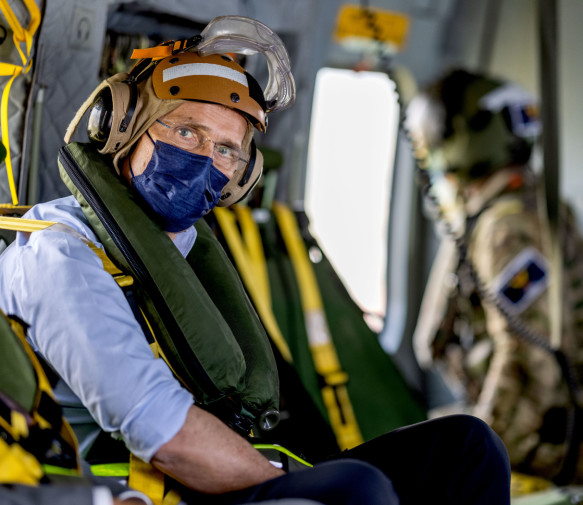 Concern: NATO leaders are concerned about the emergence of China and Russia in the High North.  Pictured here on a helicopter en route to the aircraft carrier HMS Queen Elizabeth in the Atlantic.