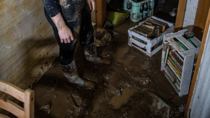 Destroyed: The ground is full of mud and there is nothing left after the flood hit Svenia's apartment.