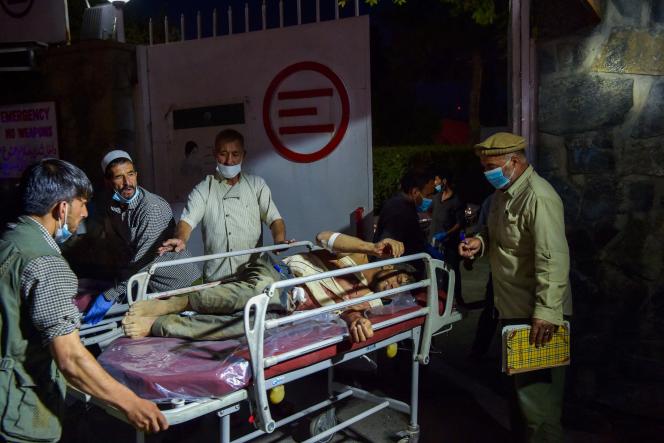 One person was injured on a stretcher in Kabul on August 26, 2021.