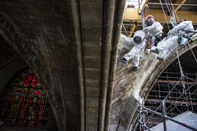 Rope workers demolished the vault of Notre Dame de Paris on April 15, 2021.