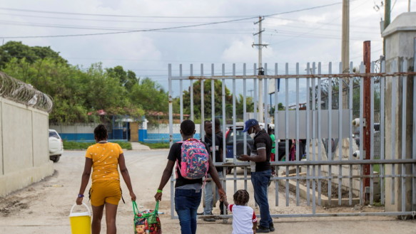 Return: A Haitian family leaves Port-au-Prince airport after being deported from the United States.  Many returnees say they will try to leave Haiti again as soon as possible.