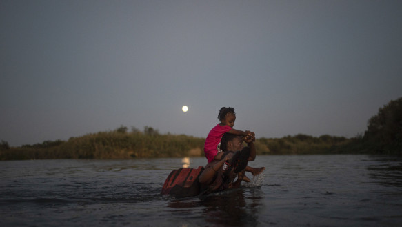 Back across the river: Haitian immigrants are now returning to Mexico, to avoid being sent home in the massive deportation process to US authorities.