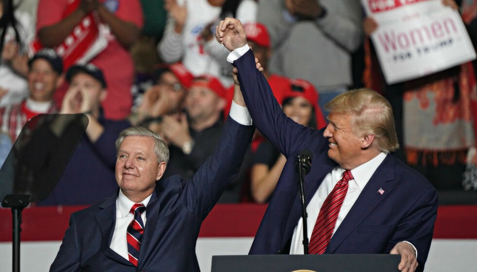 Allies: Lindsey Graham (right) has gone from being a fierce critic of Donald Trump, to becoming one of his most loyal supporters.  Photo: Richard Ellis/UPI/Shutterstock