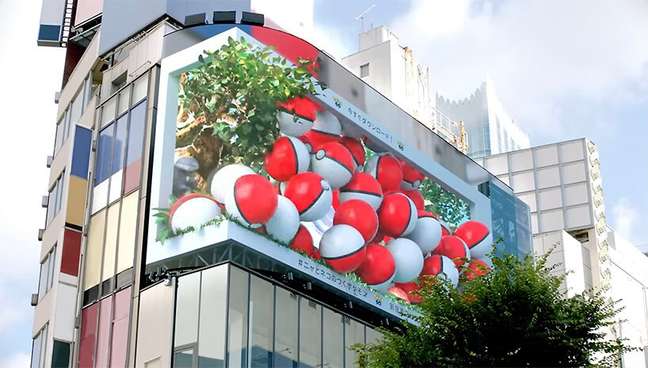 3D billboard on the corner of a building with Pokémon.
