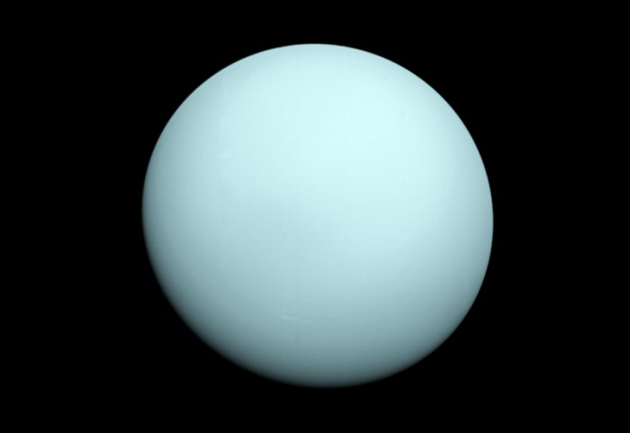 Uranus' axis of rotation is on its side, is it because of the satellite?